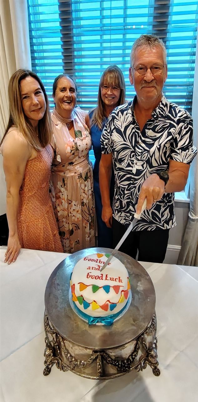 Leavers cutting cake